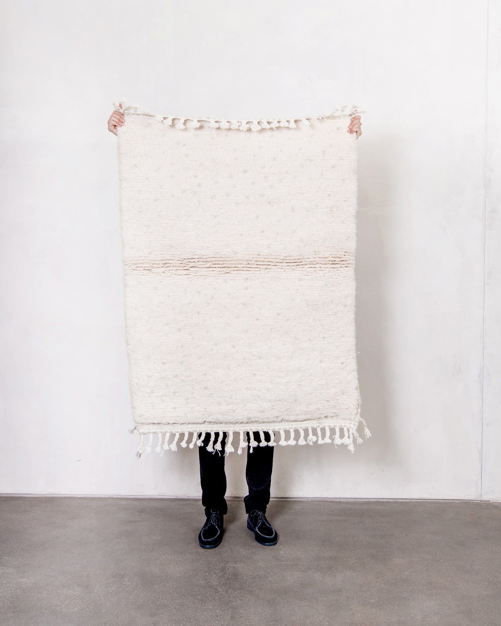 Modern, designer, handcrafted Berber rug from Morocco. Beniourain carpet with beautiful colours and patterns and fluffy wool texture.